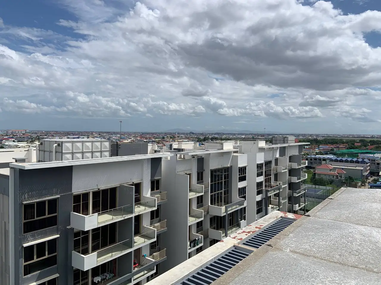 Roof top with sky shot of our water tank solutions at axis project in cambodia