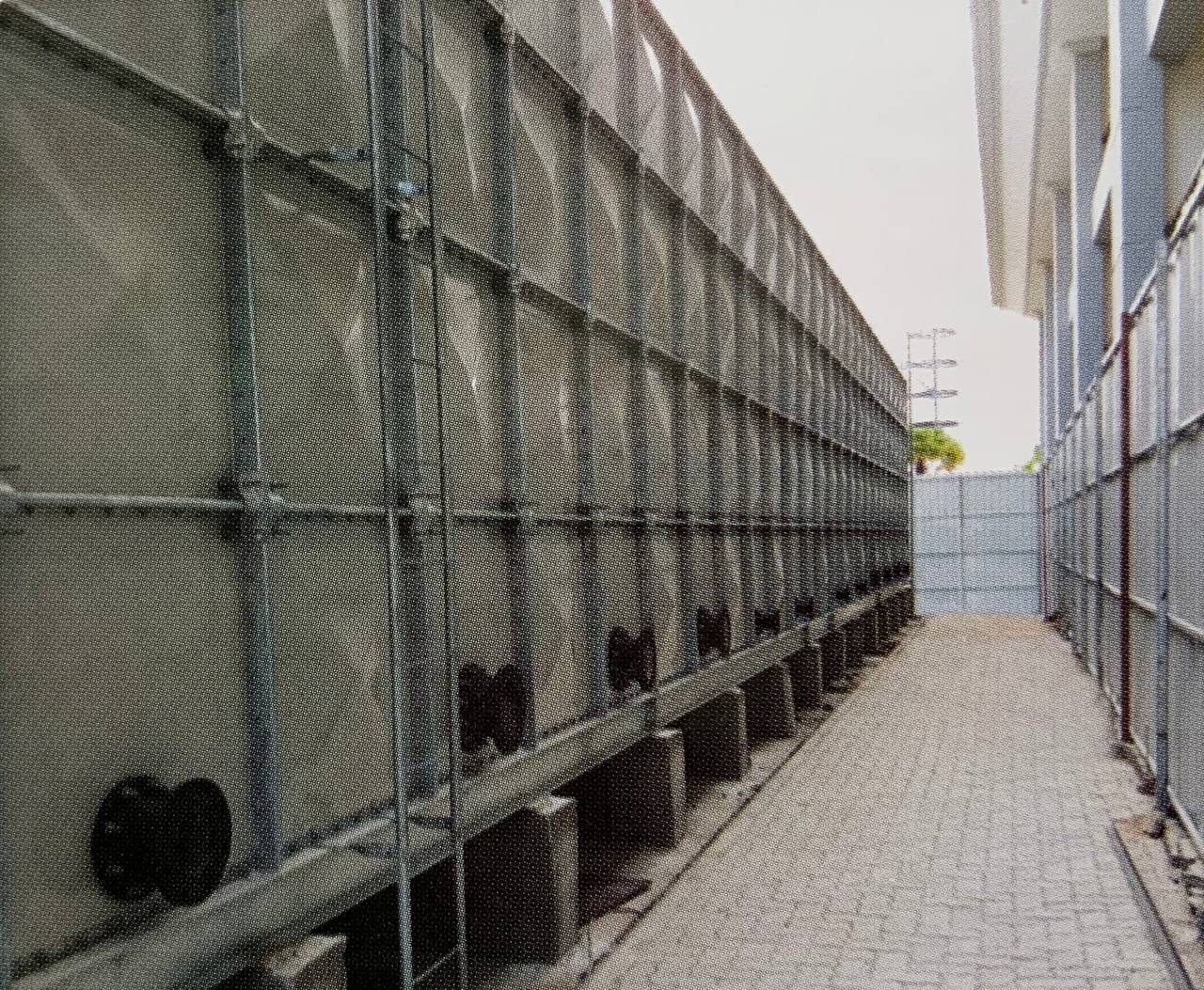 A side view photo of the GRP water tank at the National Bank of Cambodia