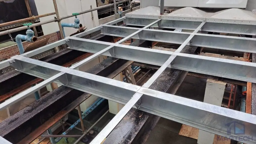 FRP/GRP domestic water tank replacement at One Finlayson Green, Singapore – new galvanized steel base frame prepared for tank installation