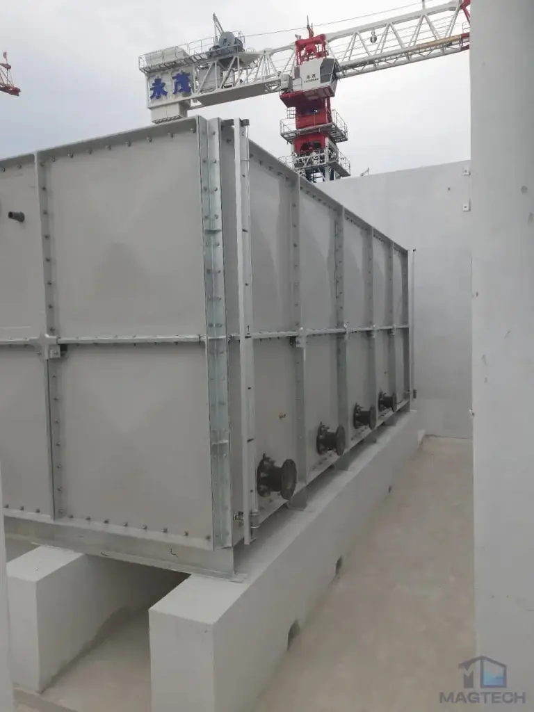 FRP water tank installation at Jalan Tembusu, Singapore – completed sectional tank installed on concrete supports
