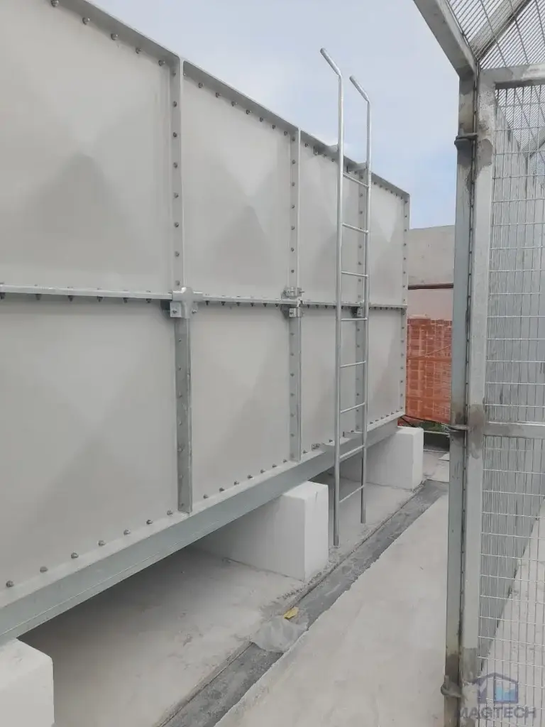 FRP water tank installation at Jalan Tembusu, Singapore – rear view of the tank with external access ladder