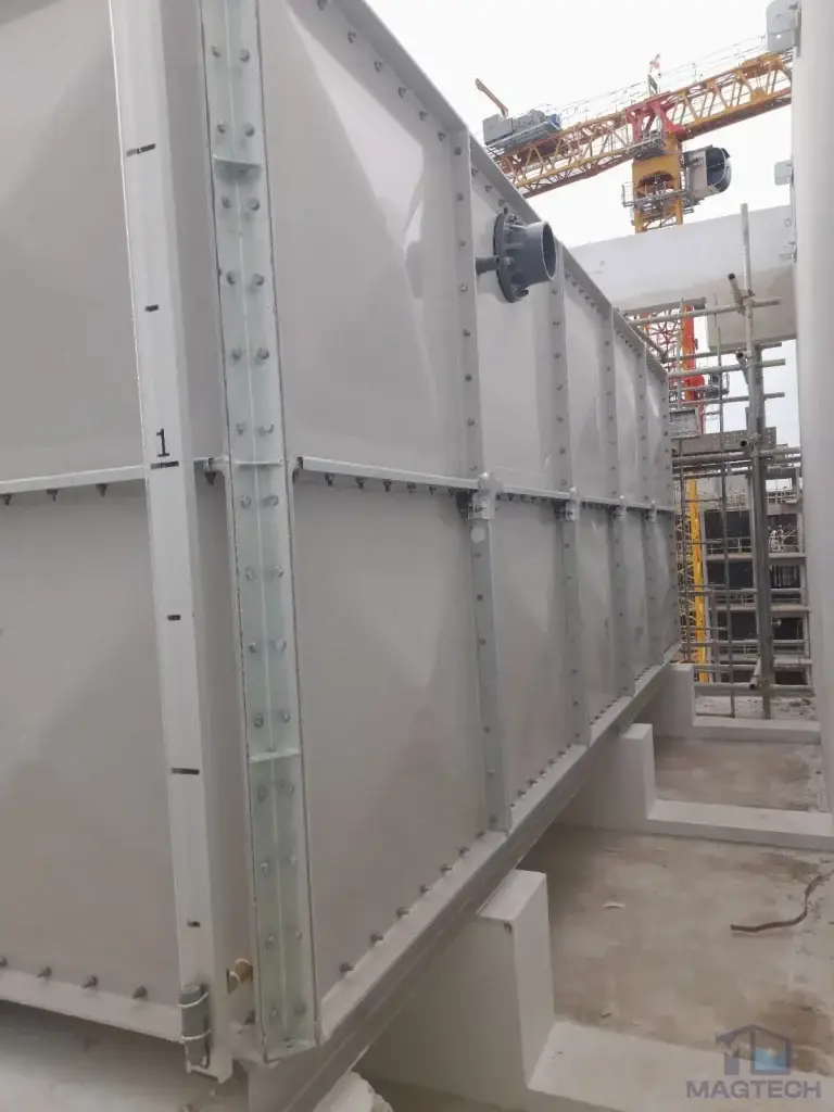 FRP water tank installation at Jalan Tembusu, Singapore – end view of the tank and galvanized corner supports