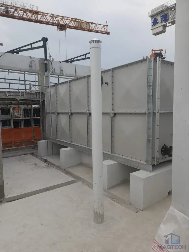 FRP water tank installation at Jalan Tembusu, Singapore – completed elevated tank with external pipework