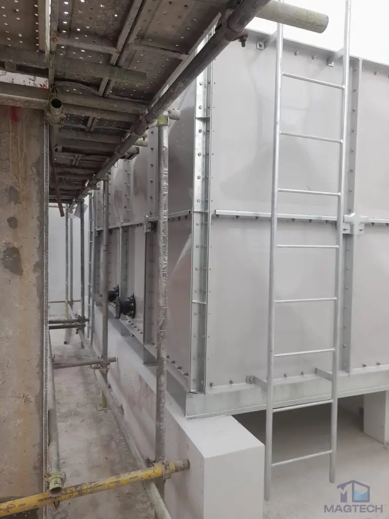 FRP water tank installation at Jalan Tembusu, Singapore – side view of the tank with external access ladder