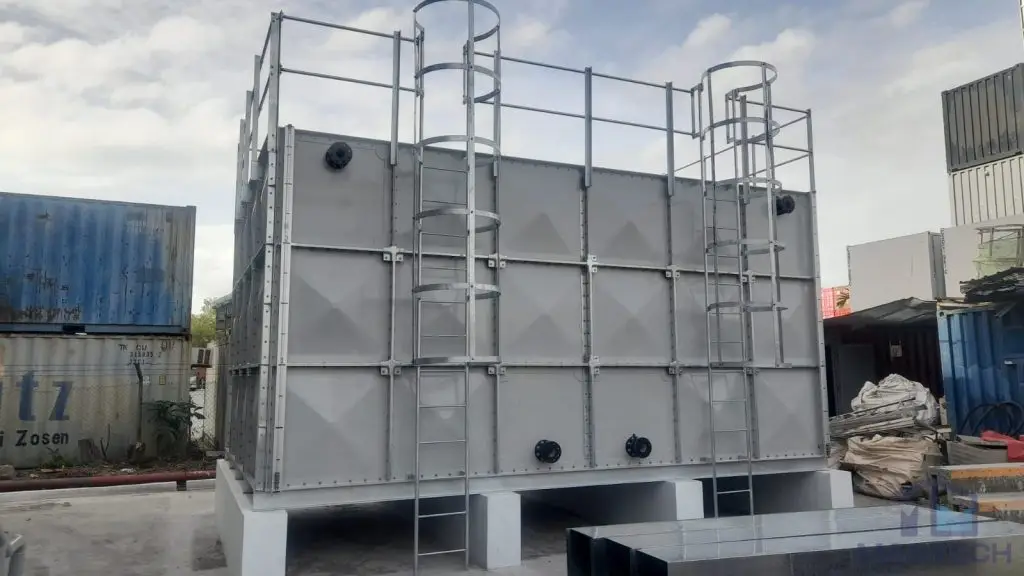 FRP water tank installation at 35 Pioneer Sector Dormitory, Singapore – front view of the completed sectional tank with access ladders