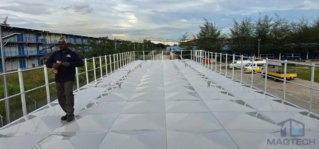FRP water tank installation at Jurong Island, Singapore – top panels and safety guardrails of the completed tank