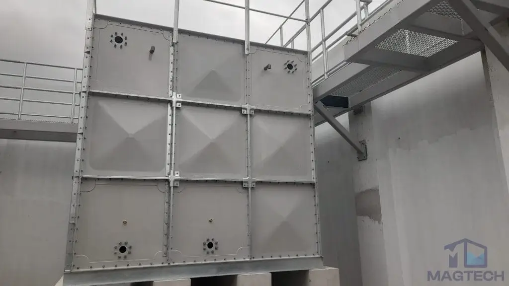 FRP water tank installation at Tengah HDB, Singapore – completed tank installed beneath the access platform