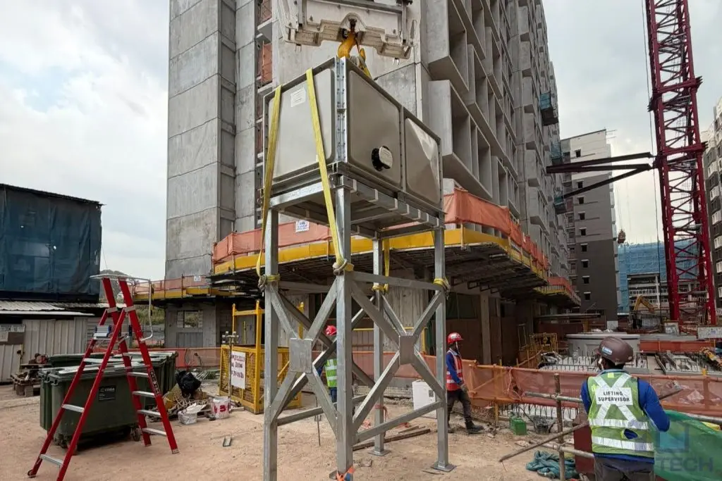 FRP water tank installation at Tengah HDB, Singapore – elevated sectional tank during installation