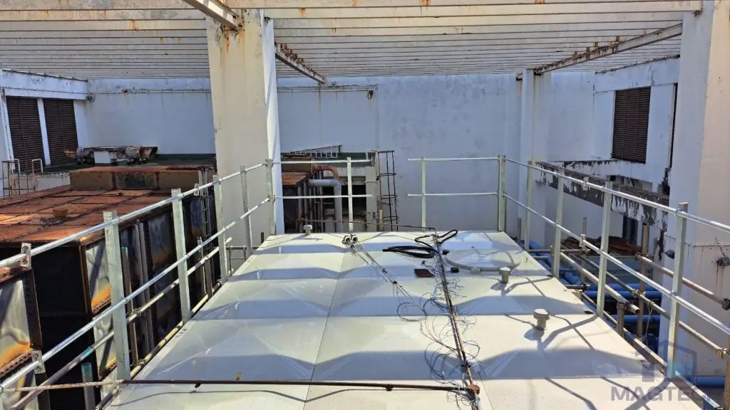 FRP/GRP domestic water tank replacement at One Finlayson Green, Singapore – top view of the existing tank and surrounding access platform