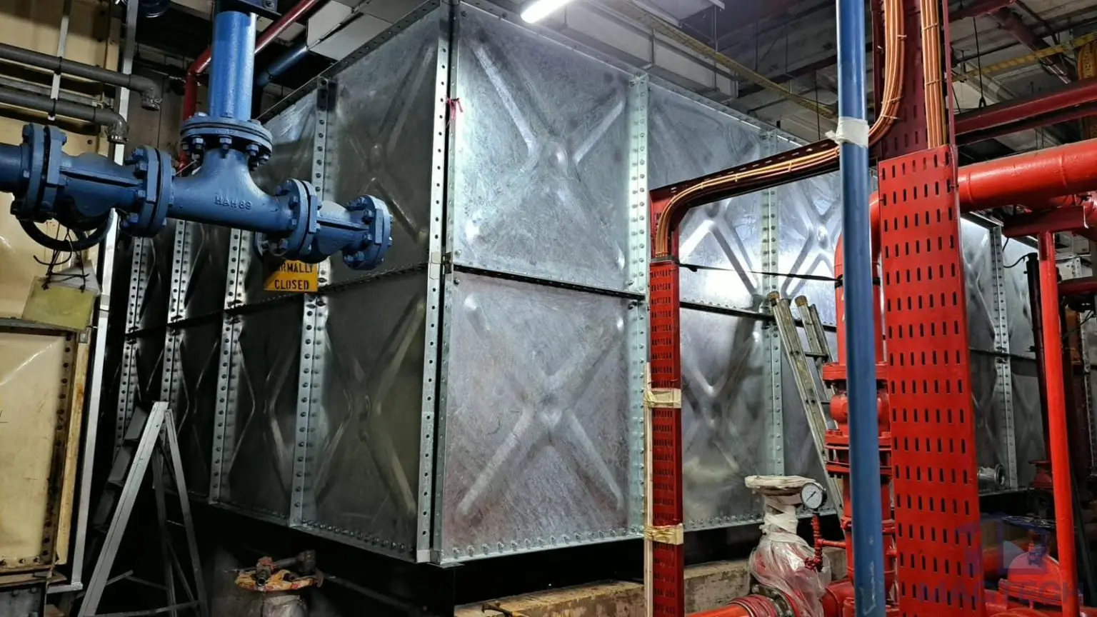 HDG water tank replacement at Changi Terminal 1, Singapore – completed sectional tank connected to plant room piping
