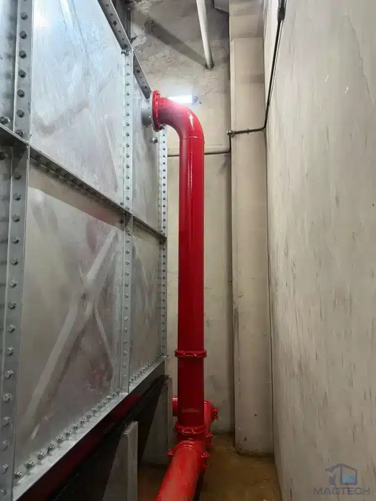 HDG water tank replacement at Changi Terminal 1, Singapore – narrow access space between the tank and plant room wall