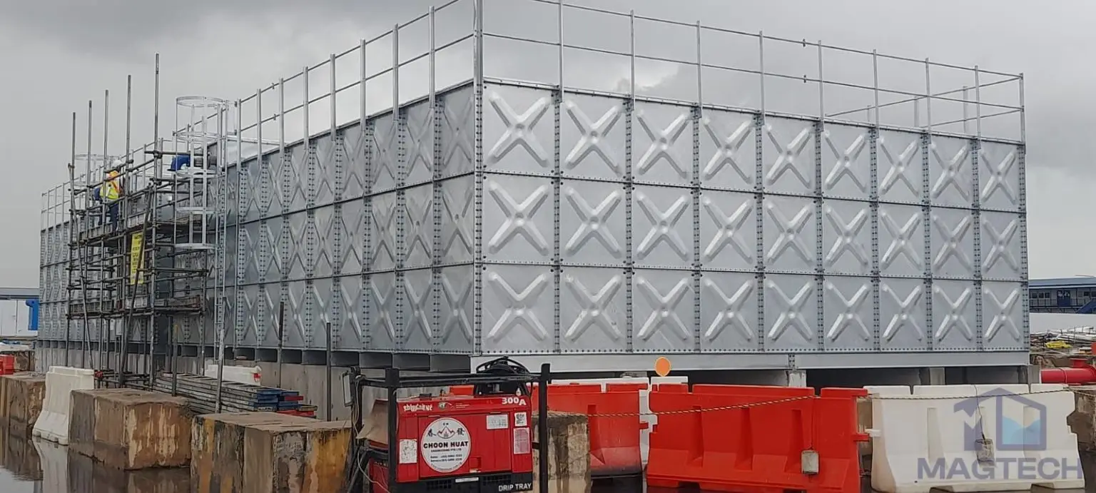 Hot-dipped galvanized pressed steel water tanks at ARC Changi T5, Singapore – side view of completed twin HDG sectional tanks