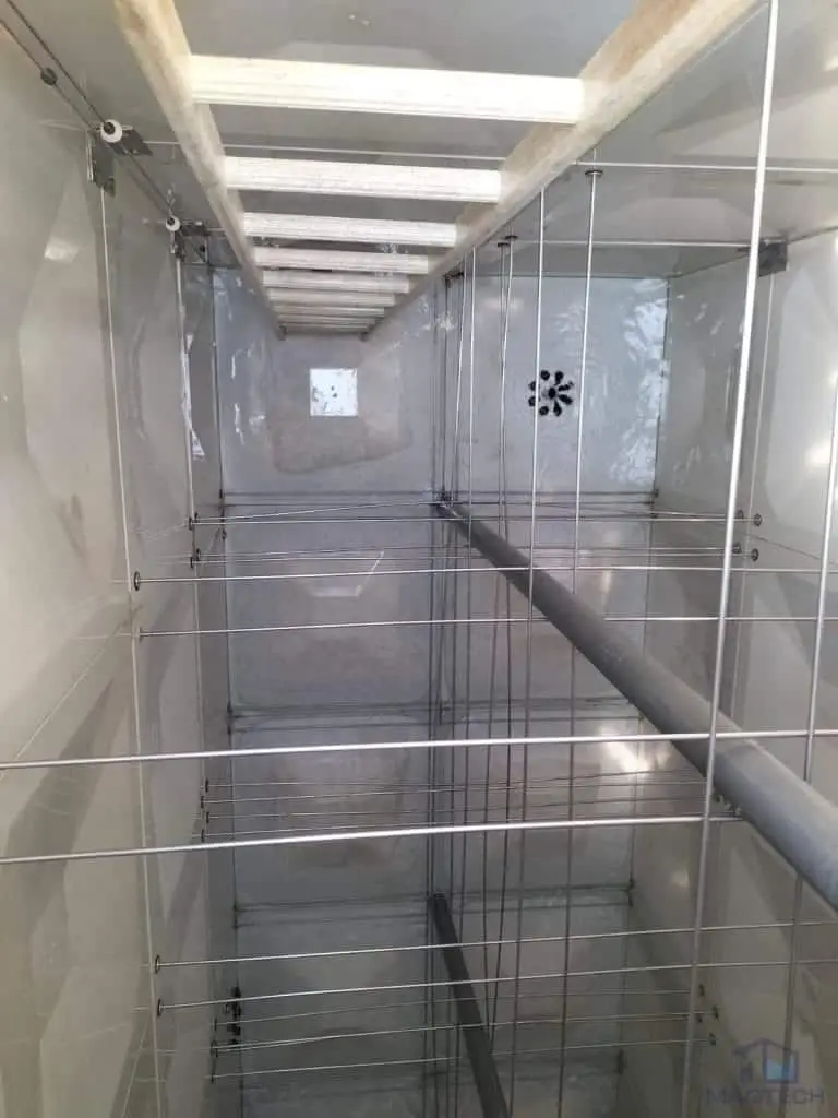 FRP water tank repair at Margaret Villa, Singapore – completed internal panels and support bracing