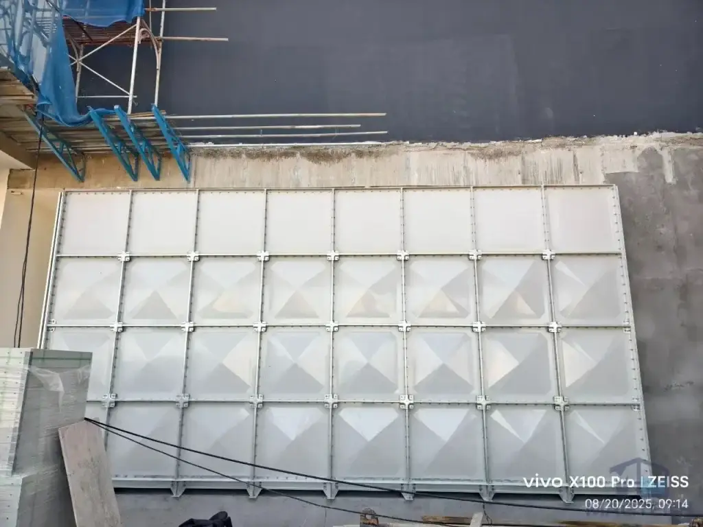 FRP/GRP water tank installation at Norodom Business Centre, Cambodia – front view of the completed sectional tank