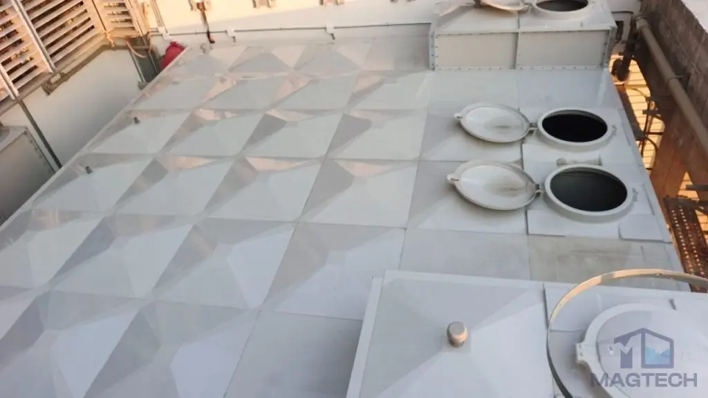 FRP/GRP water tank installation at Norodom Business Centre, Cambodia – two open access hatch covers on the tank roof