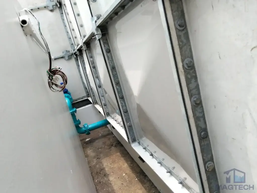 FRP sectional water tank repair at Southbank, Singapore – exterior panel joints in the narrow access area