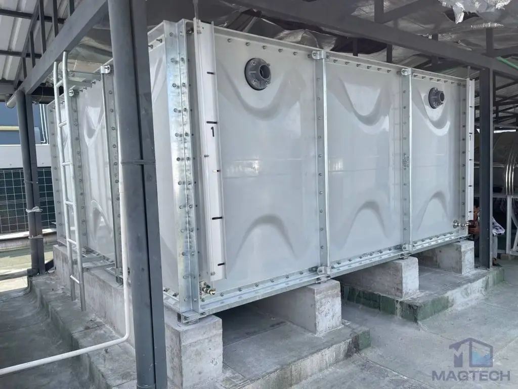 FRP sectional domestic water tank installation at Samaky Tower, Cambodia – side view of the completed tank on concrete supports