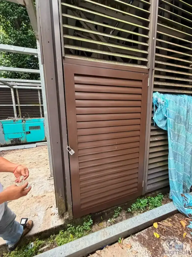 FRP water tank replacement at Changi Cove, Singapore – access door to the louvred tank enclosure