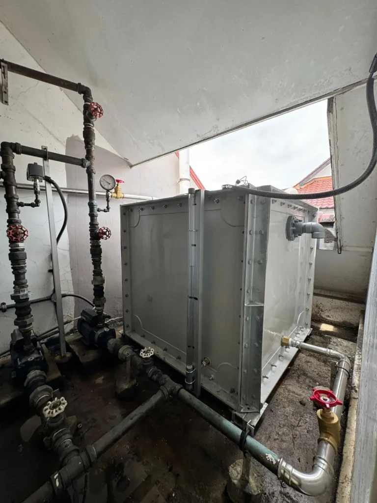 Water tank replacement at 110C Sixth Avenue, Singapore – completed sectional tank connected to the existing pump system