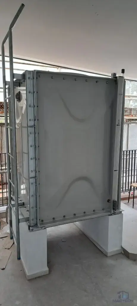FRP domestic water tank installation at 92 Siglap Drive, Singapore – side view of the completed tank on concrete supports