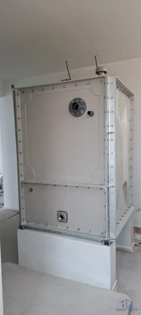 FRP domestic water tank installation at 92 Siglap Drive, Singapore – front view of the completed sectional tank