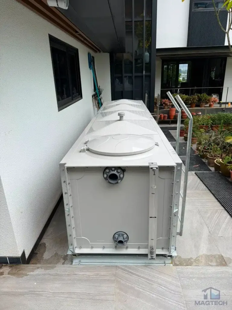 FRP rainwater tank installation at 36 Fifth Avenue Singapore - end panel connections and manhole