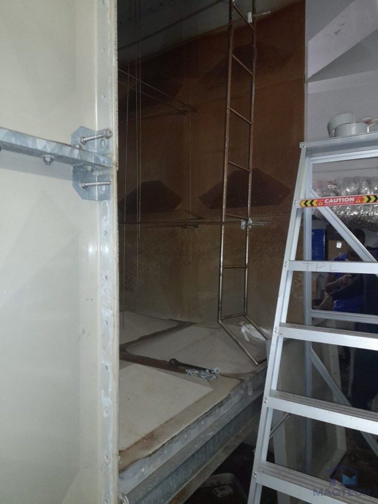 FRP water tank panel repair at 8 Novena Drive Singapore - tank dismantled to reach lowest tier