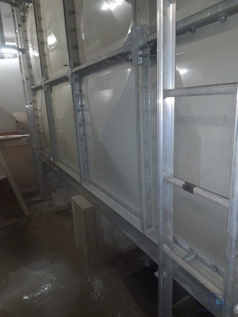 FRP water tank panel repair at 8 Novena Drive Singapore - tank reinstated after panel replacement