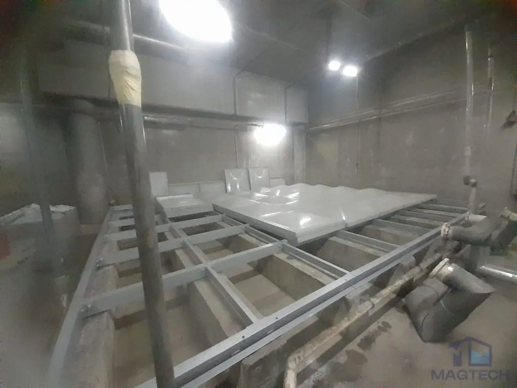Insulated FRP water tank replacement at Resorts World Sentosa, Singapore - FRP panels being assembled on the steel base frame