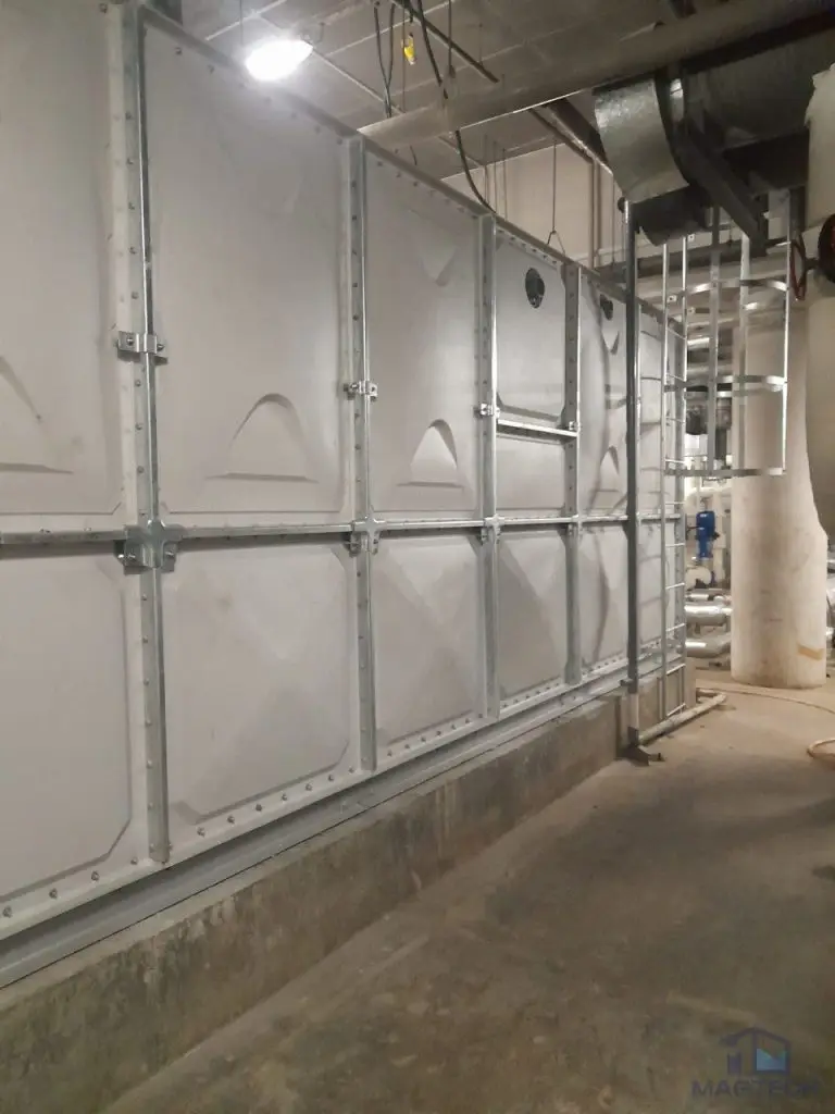 Insulated FRP water tank replacement at Resorts World Sentosa, Singapore - completed sectional tank with access ladder