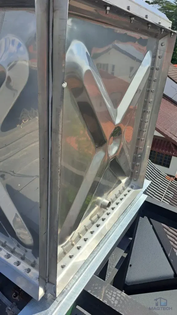 SS316 water tank installation at 11 Greenleaf View Singapore - bolted stainless panel joints