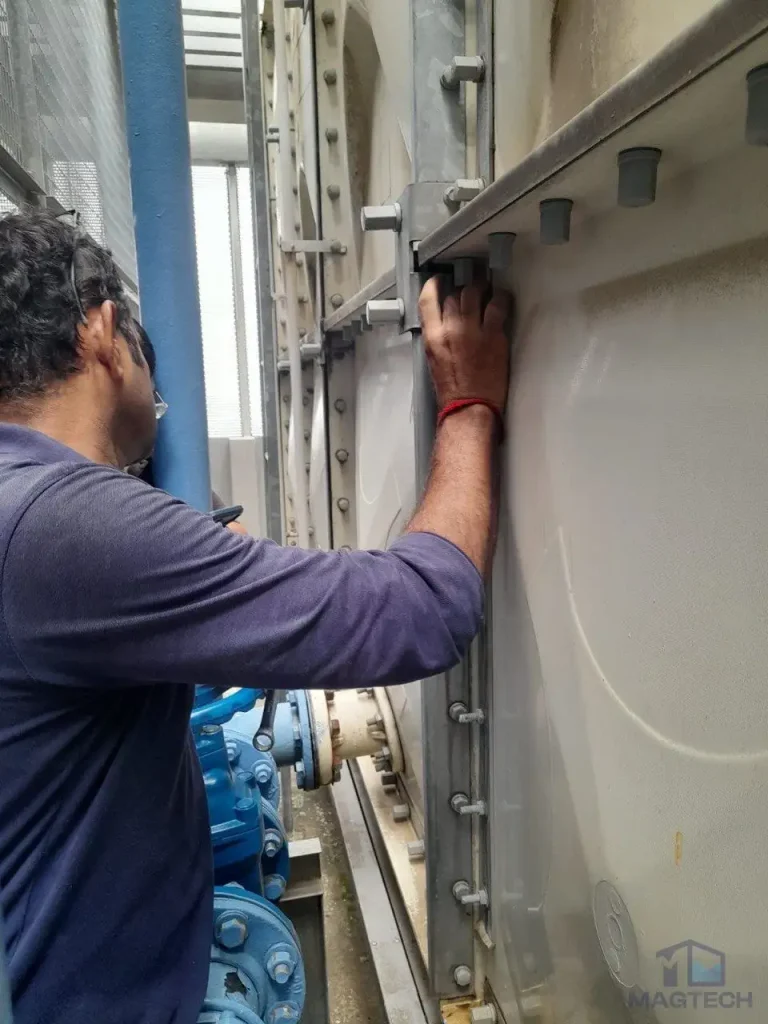 FRP water tank repair at New Futura Singapore - leak traced and rectified externally
