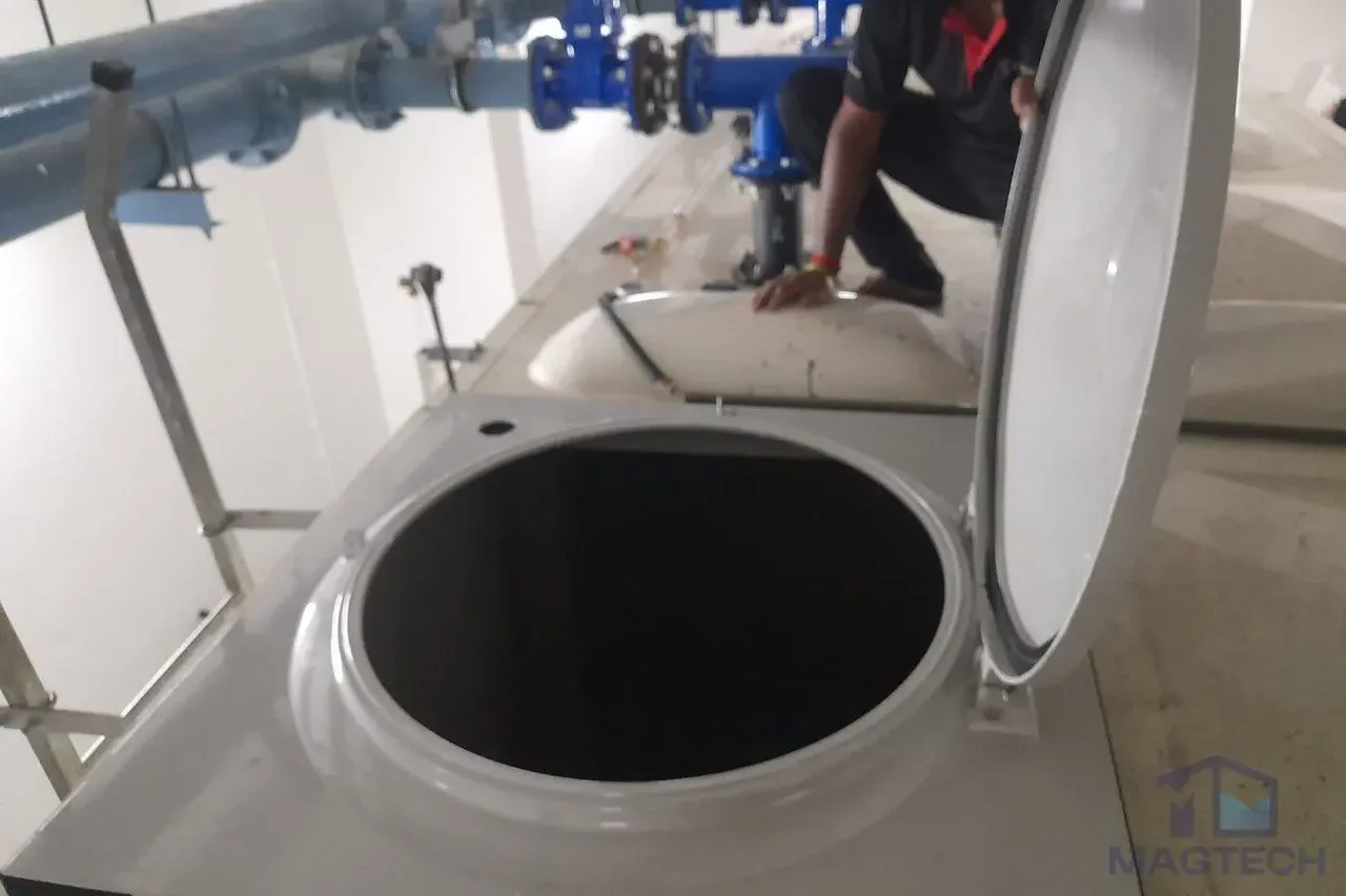 FRP water tank repair at New Futura Singapore - new manhole cover panel installed