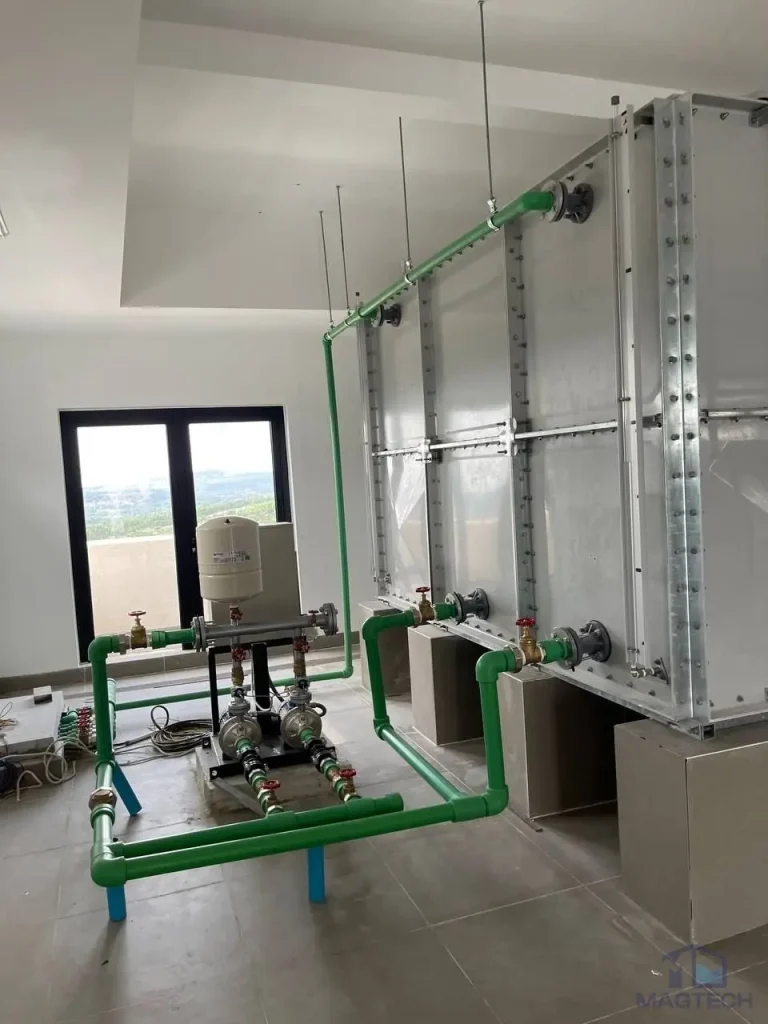 GRP water tank installation at Grand Villa Cambodia - completed tank in the plant room